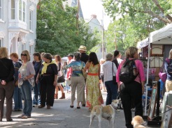 exhibitors and visitors filled up Front Street under variable skies